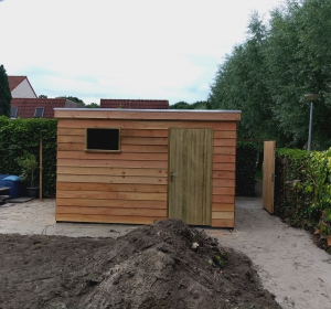 Bouw van een tuinberging en bijbehorend grondwerk. - Hoveniersbedrijf C.K. van Mourik de hovenier voor West Betuwe, Tiel, Culemborg, Geldermalsen, Buren