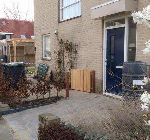 Renovatie van een zijtuin. Bestrating, gazon en beplanting  - Hoveniersbedrijf C.K. van Mourik West-Betuwe Geldermalsen Tiel Culemborg